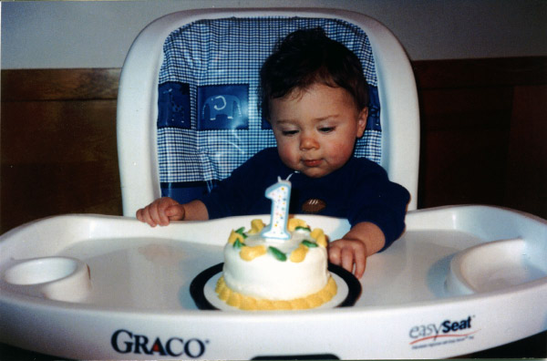 jesse with 1st birthday cake